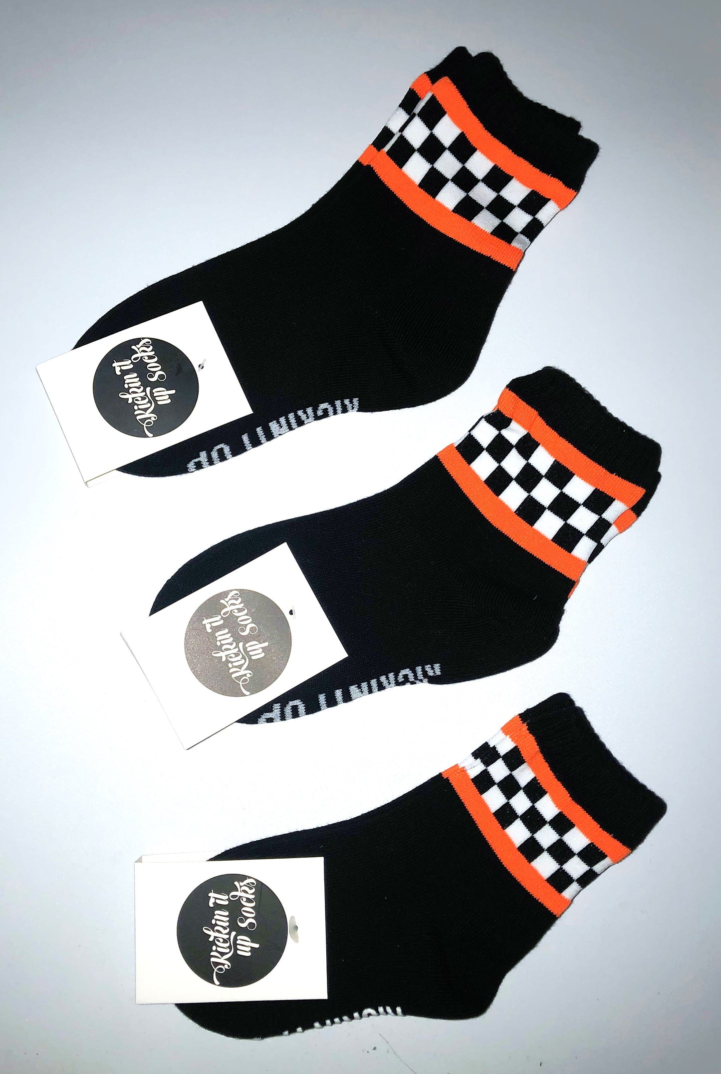Toddler and Youth Black Socks with Checkered Pattern and Orange Stripes